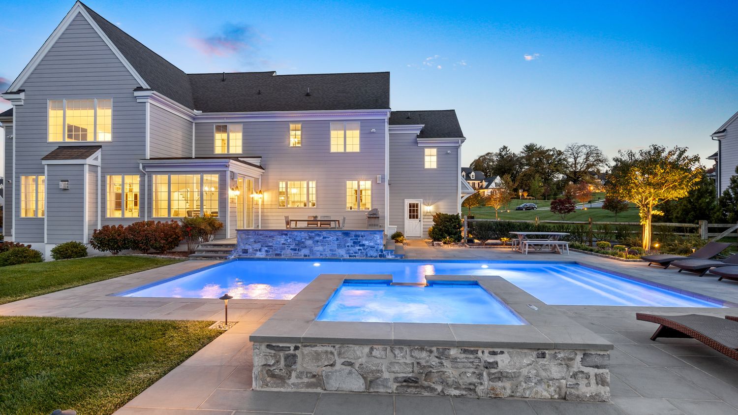 After: graded to blue hour, pool and windows lit