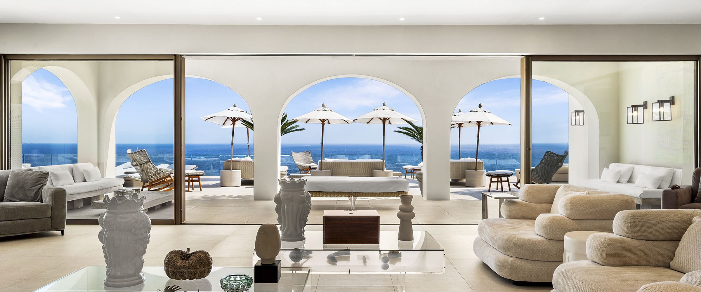 Living room opening onto an ocean terrace